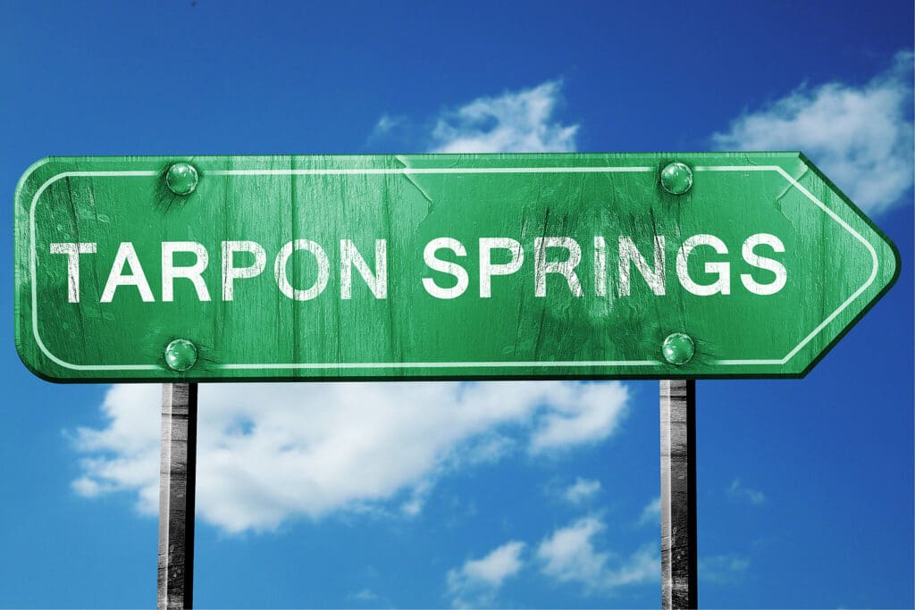 tarpon springs road sign on a blue sky background